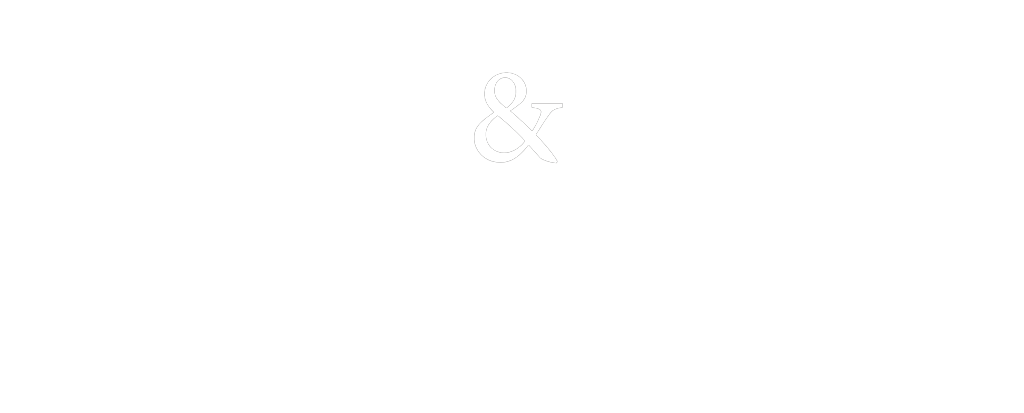 Hollingshead & Dudley Trial Lawyers logo in white